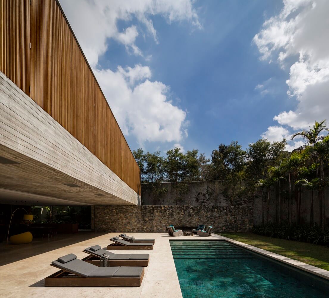 Casa Moderna em São Paulo por StudioMK27 - Casa dos Ipês 004 Fachada + Concreto + Madeira + Pedras