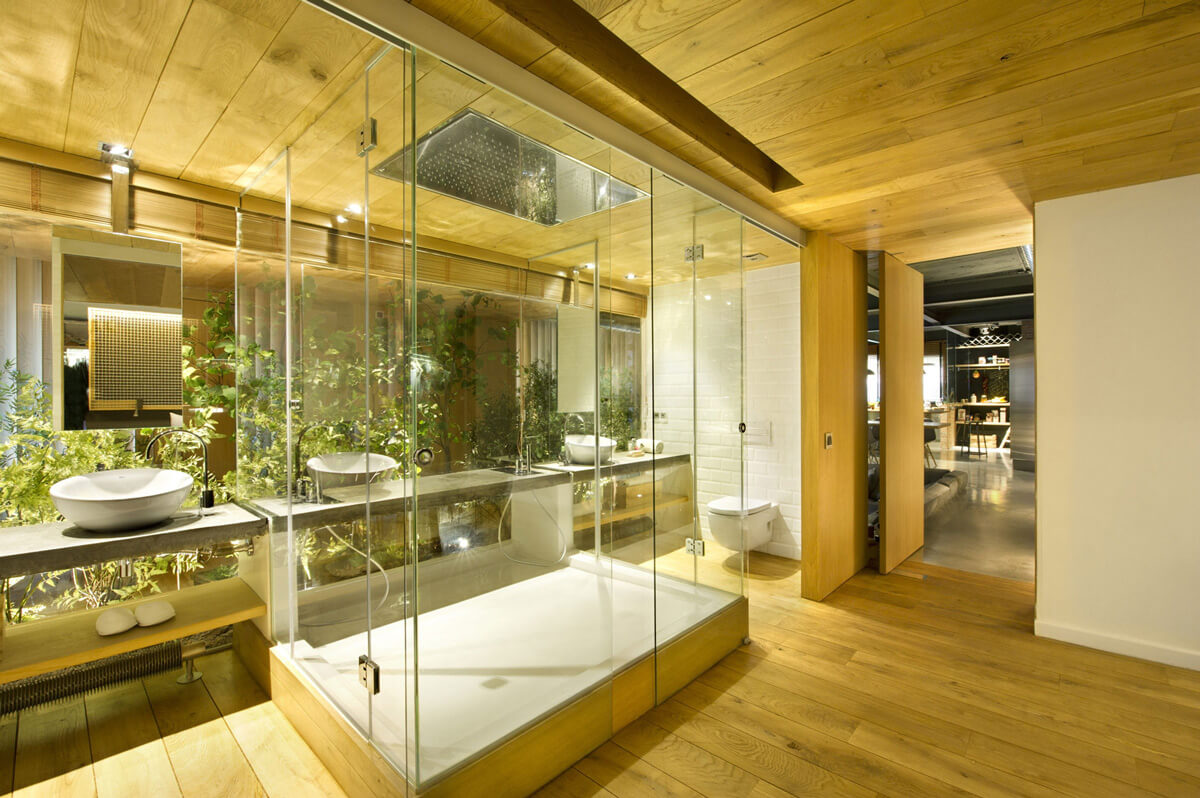 34 Ideias de decoração para Ambientes Integrados quarto com banheiro divisória de vidro piso de madeira fonte decostore